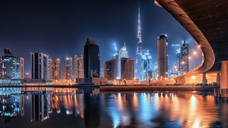 Dubai skyline by the ocean at sunset, showcasing modern architecture